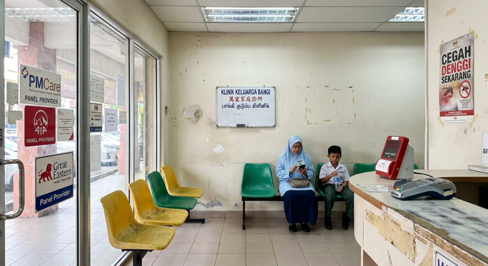 Klinik Keluarga Bangi waiting area — makcik and schoolboy, panel provider stickers on the glass door