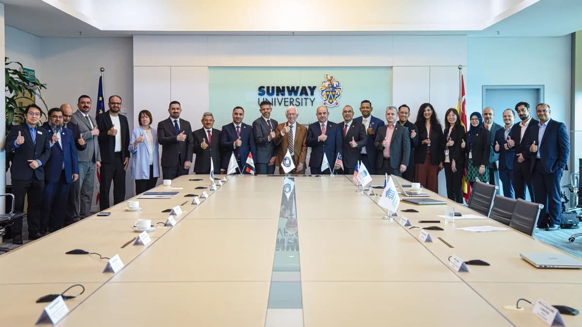 Sunway and Iraqi university representatives standing together after the collaboration launch