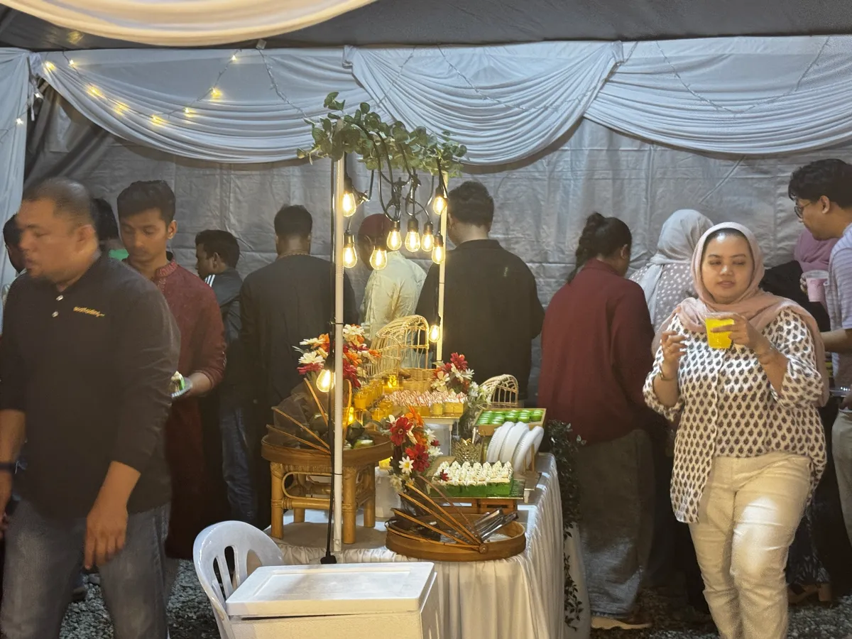Staff at company dinner buffet