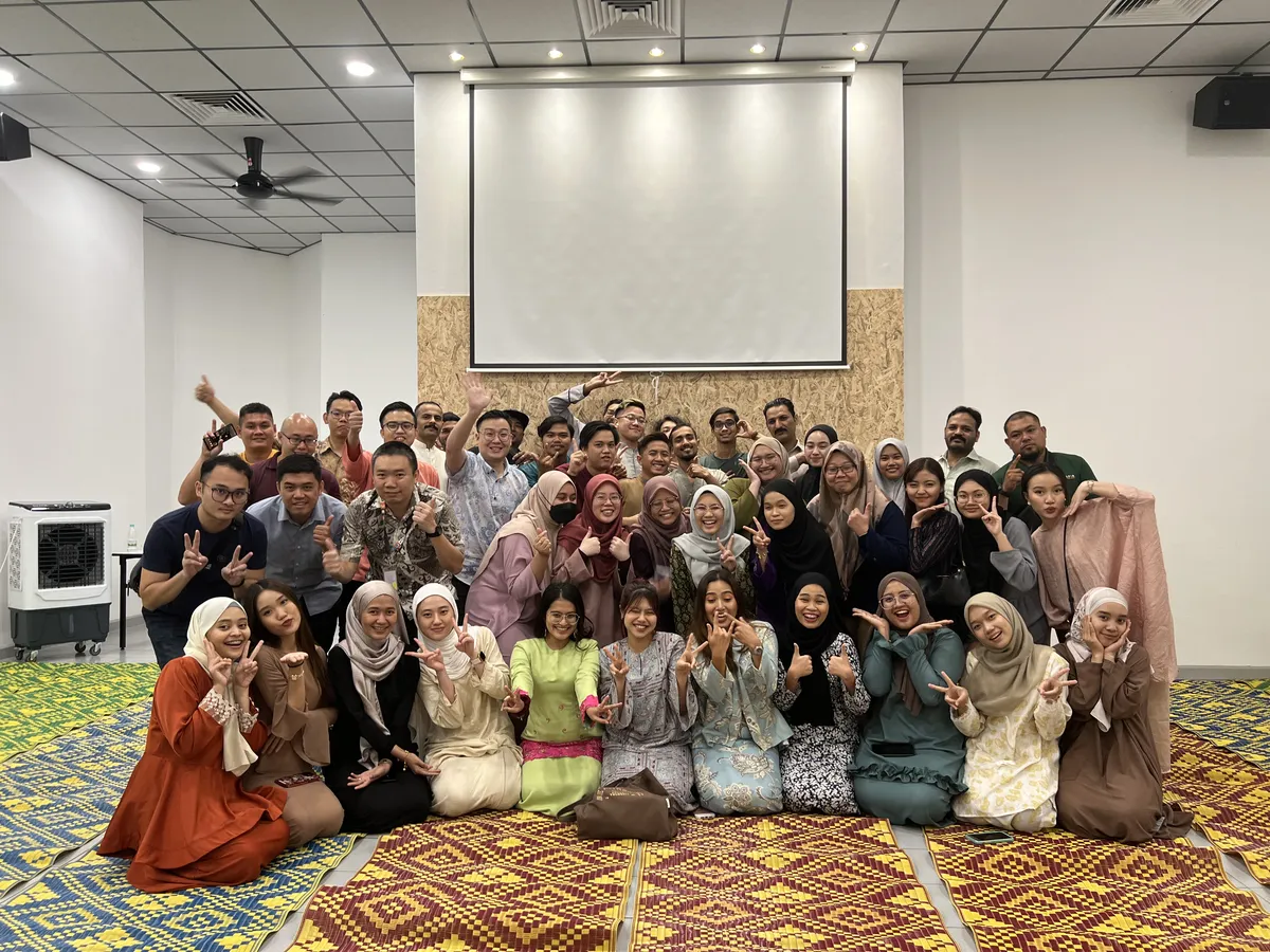 Full Utopia Group team — fun group photo with peace signs