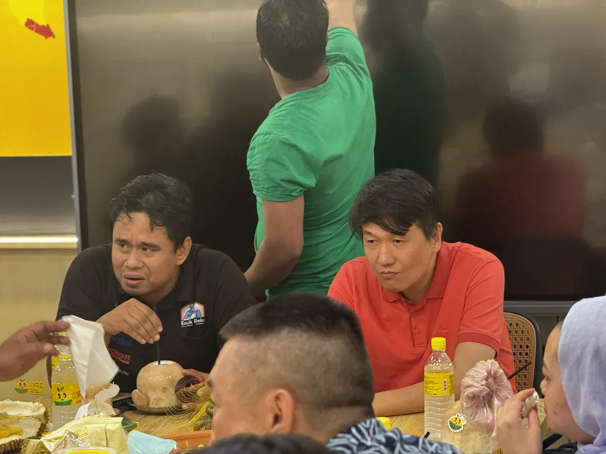 Team enjoying durian together