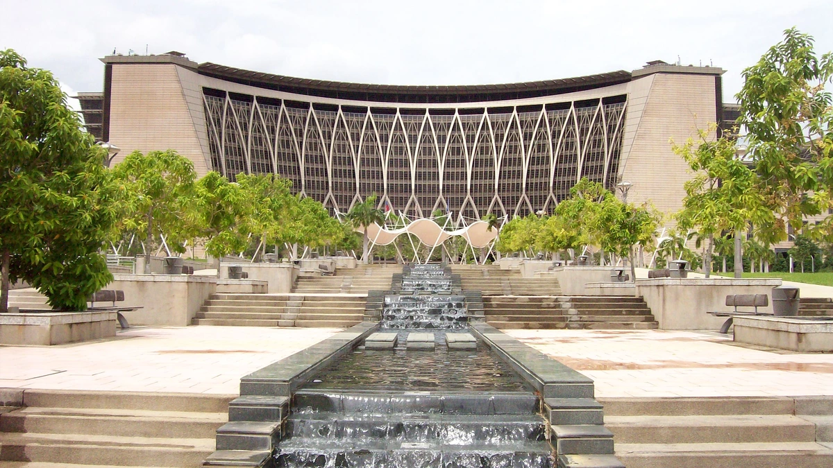 The Ministry of Finance building in Putrajaya seen across a stepped water feature and plaza