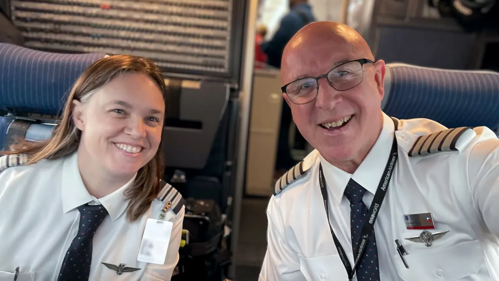 American Airlines pilots Tammy Caudill and John Dudley sit in the flight deck after a contrail avoidance flight