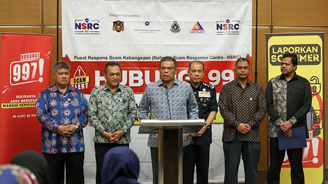 Malaysian officials hold a National Scam Response Centre press conference