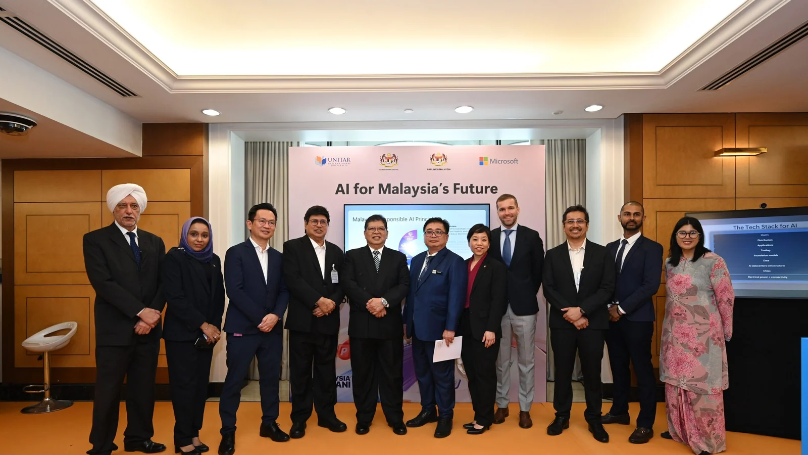 Organisers and partners of Malaysia's AI for Policymakers showcase gather in Parliament