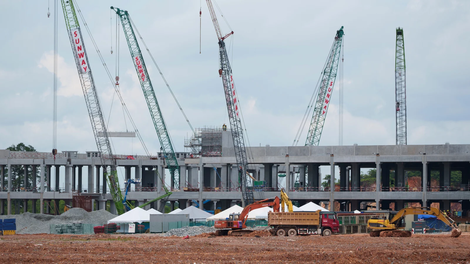 Cranes surround a data-centre building under construction in Sedenak Tech Park, Johor