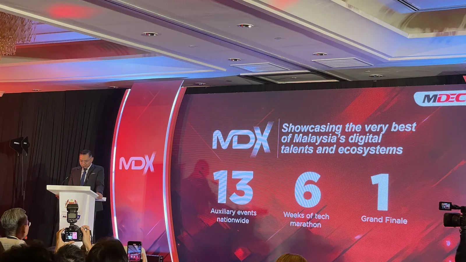 A speaker presenting at the Malaysia Digital Expo 2023 media launch in Kuala Lumpur