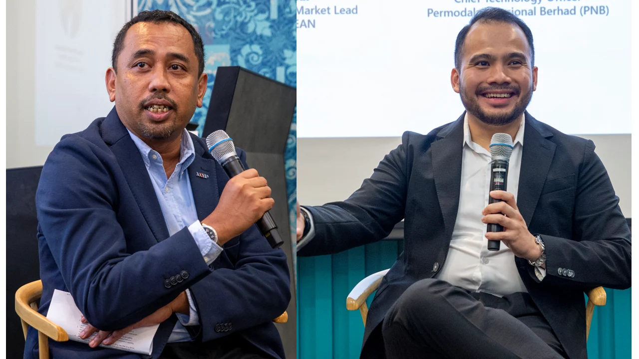 Johor Corporation executive Ahmad Yusri Mohamad and PNB chief technology officer Izzat Aziz at the Work Trend Index event