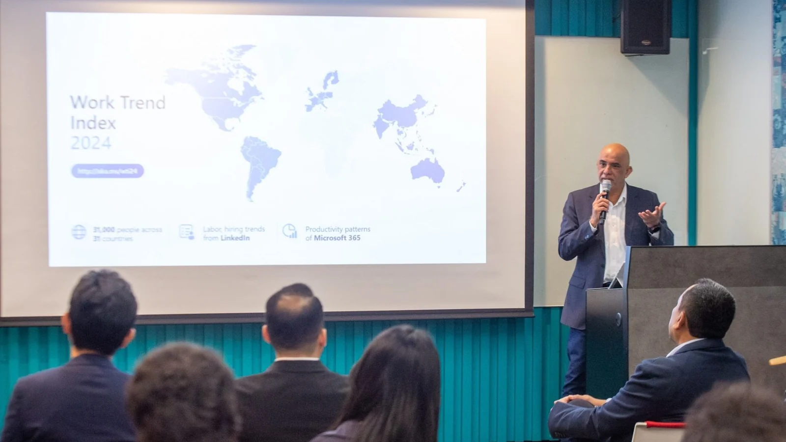Microsoft Malaysia managing director K Raman presents the 2024 Work Trend Index to an audience