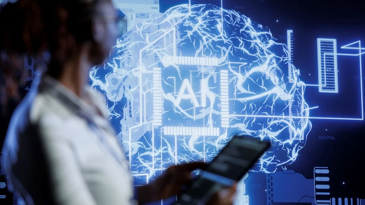 A visitor looks at an artificial intelligence installation in Microsoft Malaysia's 2025 industry feature