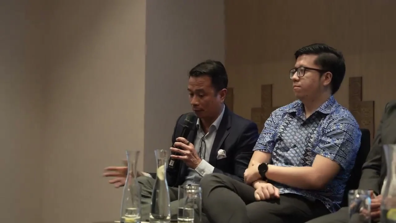 A working-group member speaks during an AI Malaysia policy engagement panel