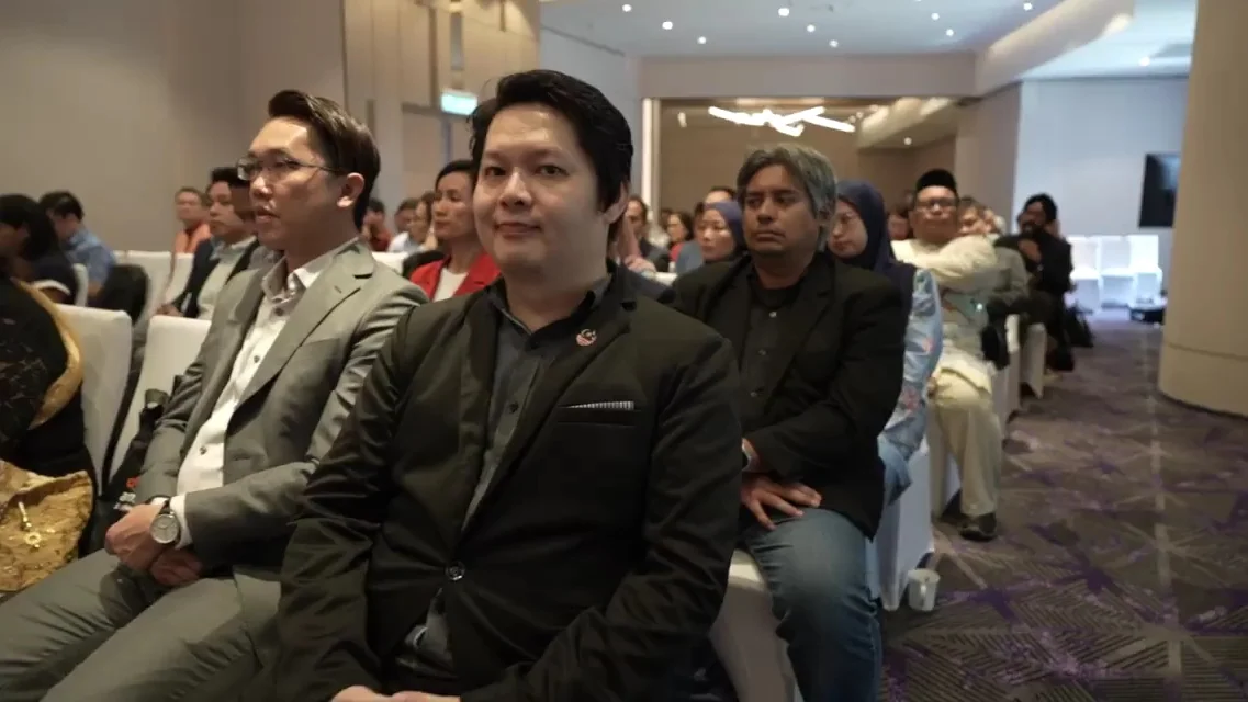 Working-group participants listen during a National AI Office engagement session in Kuala Lumpur