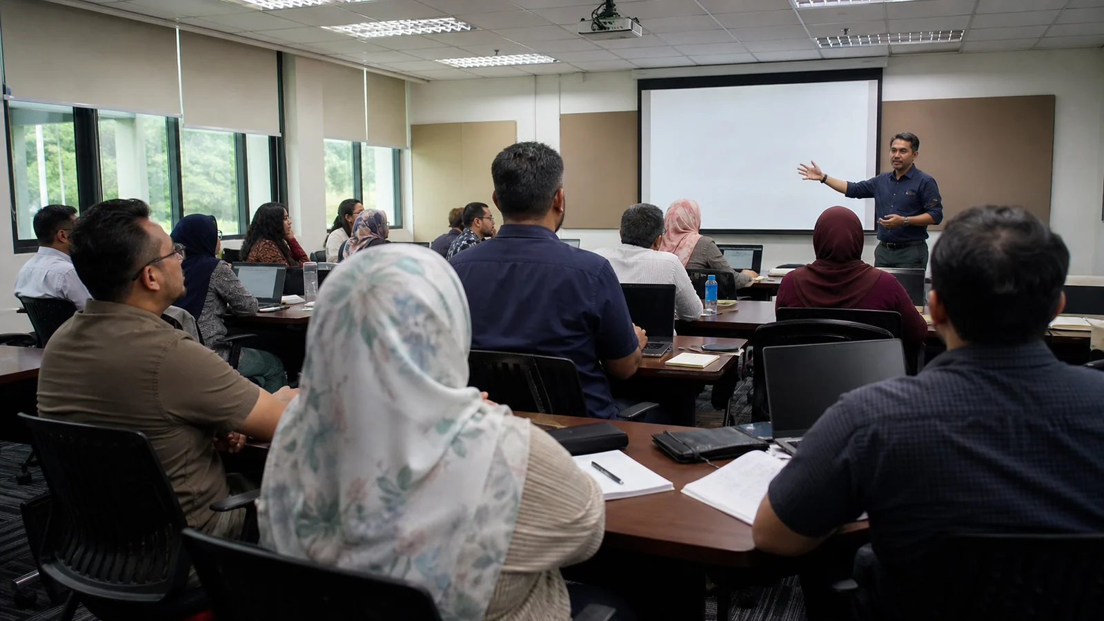 Malaysian university lecturers and researchers attend a contextual seminar about AI in higher education