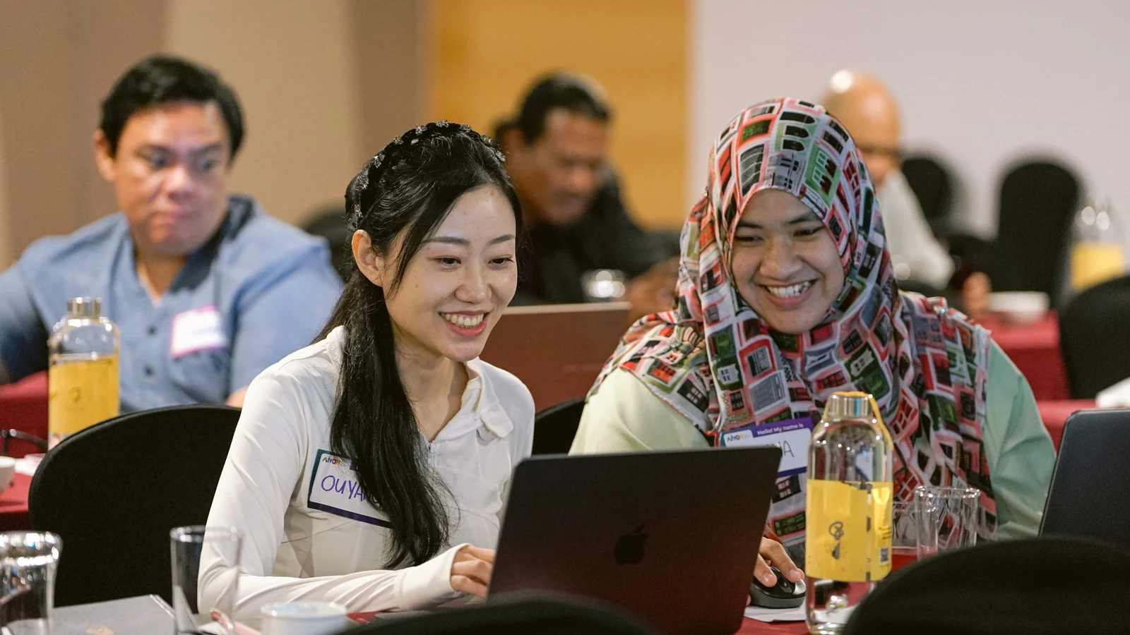 AiYOH participants use laptops during the later ICOSH 2025 workshop