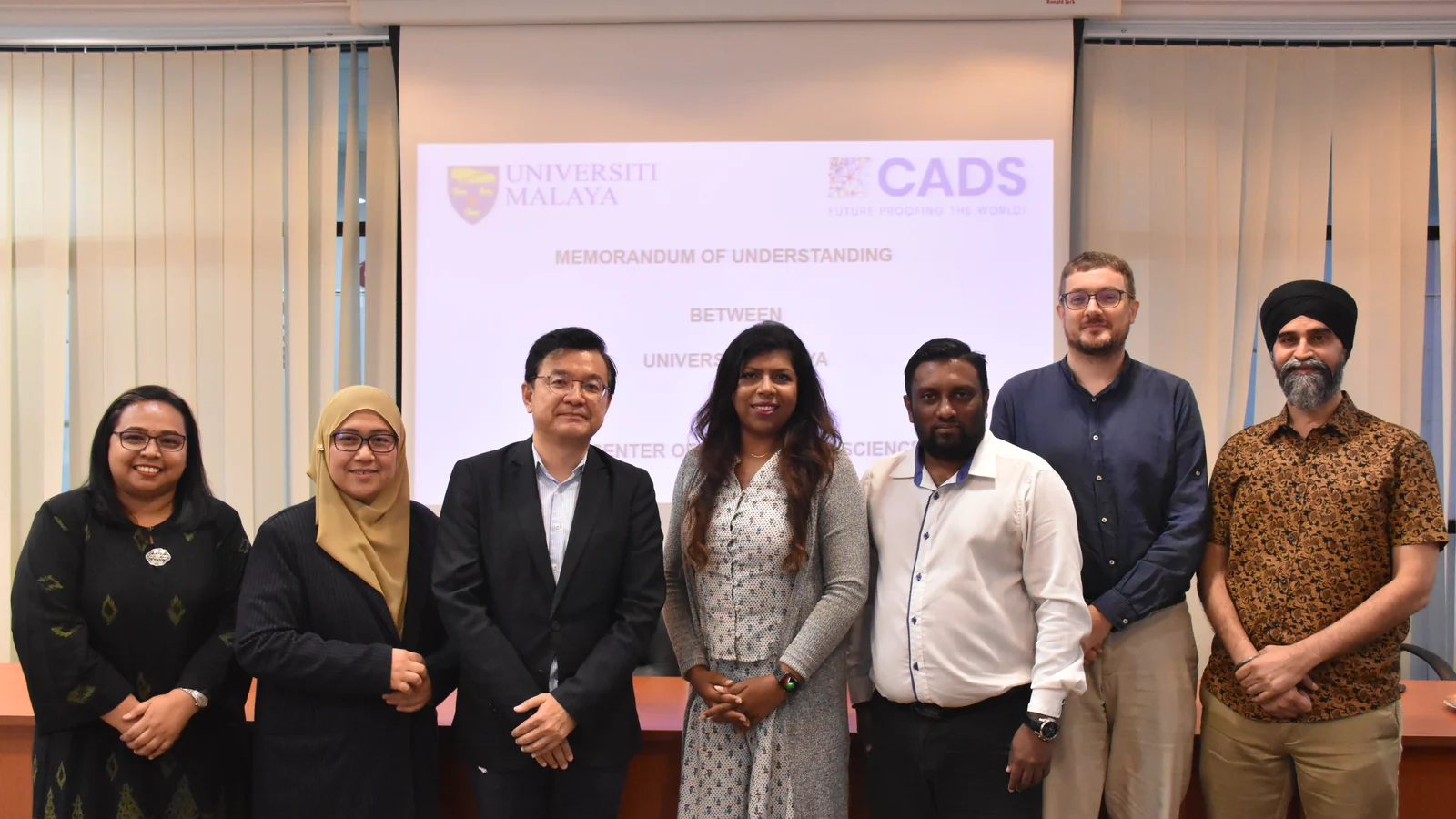 Universiti Malaya and CADS representatives at their 2023 data-science partnership signing