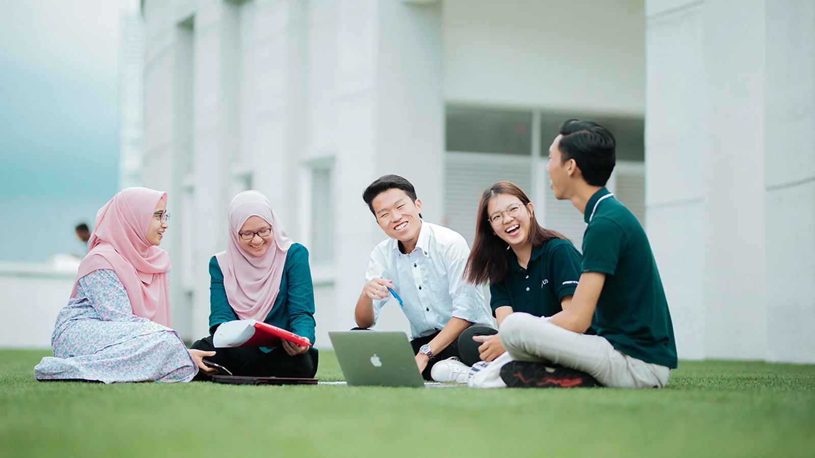 Universiti Malaya students study together on campus