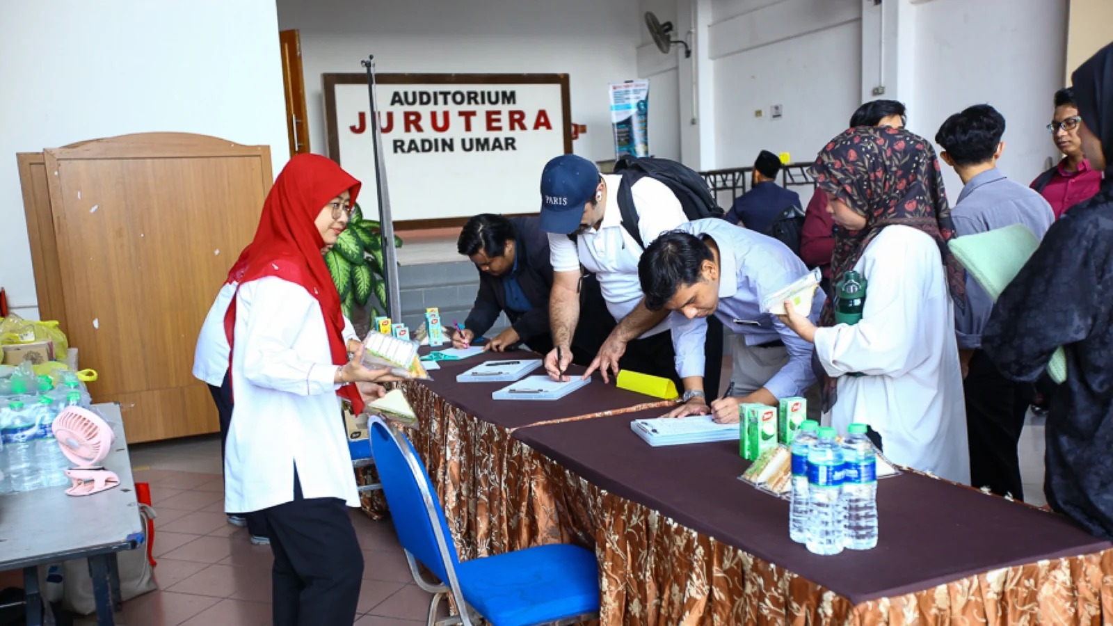Participants register at the Jurutera Radin Umar Auditorium for UPM's workplace-safety event