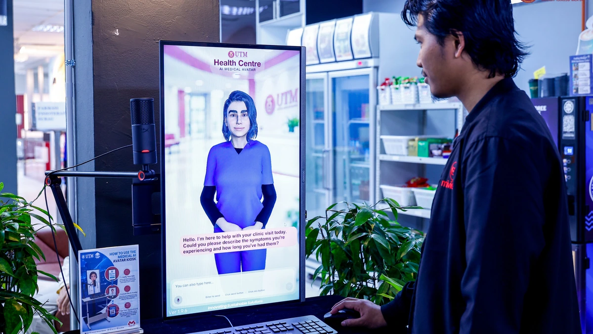 A user stands at the AI Medical Avatar kiosk, with a digital avatar on a tall screen and a keyboard below it