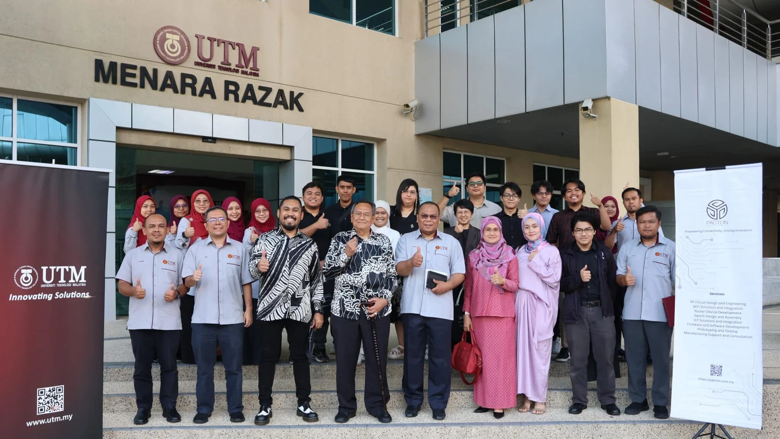 UTM and Pacton participants gather outside Menara Razak after the collaboration signing